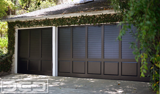 Black plantation style garage doors